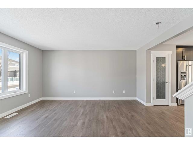 2464 Glenridding Bv Sw, House attached with 3 bedrooms, 2 bathrooms and null parking in Edmonton AB | Image 12