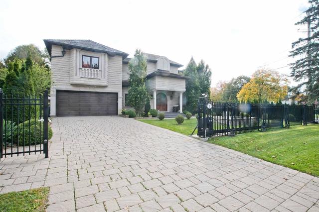 1 Tanvalley Crt, House detached with 4 bedrooms, 6 bathrooms and 8 parking in Toronto ON | Card Image