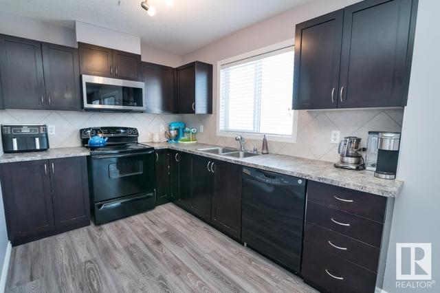 67 - 11 Clover Bar Ln, House attached with 2 bedrooms, 1 bathrooms and null parking in Edmonton AB | Image 5