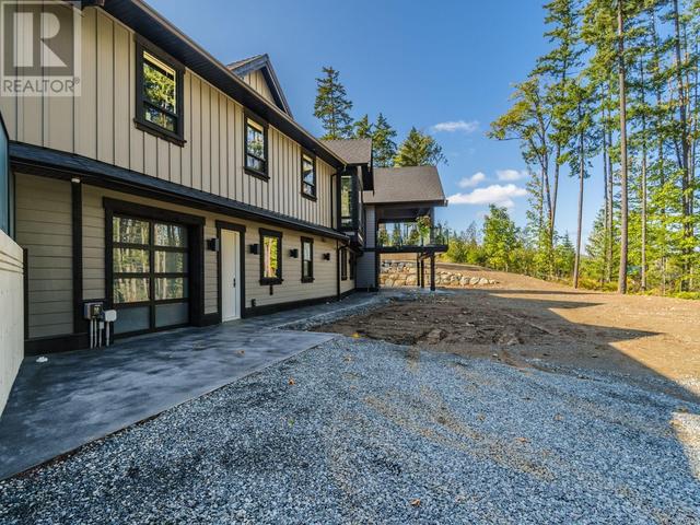 2655 Steve Ellis Rd, House detached with 7 bedrooms, 7 bathrooms and 4 parking in Nanaimo C BC | Image 77