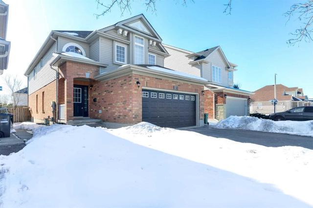 52 Milson Cres, House detached with 4 bedrooms, 3 bathrooms and 2 parking in Guelph ON | Image 2