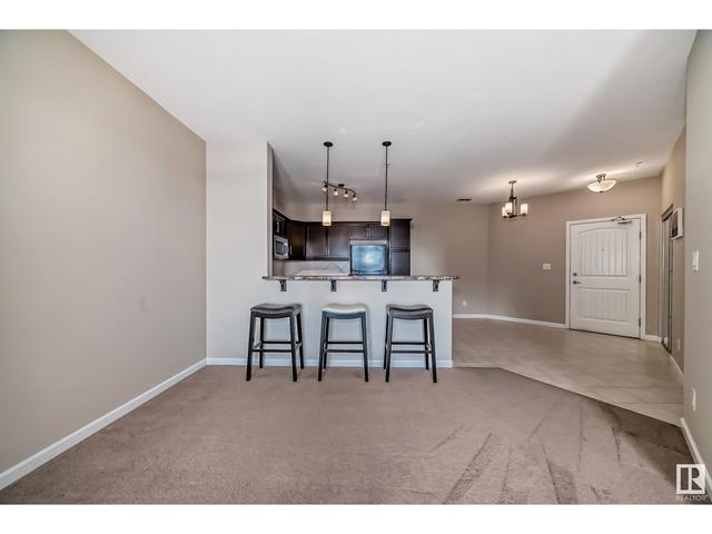 310 - 6083 Maynard Wy Nw, Condo with 1 bedrooms, 1 bathrooms and 2 parking in Edmonton AB | Image 19