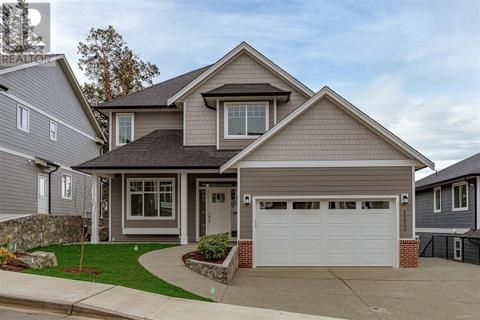 1212 Ashmore Terr, House detached with 5 bedrooms, 4 bathrooms and 5 parking in Langford BC | Card Image