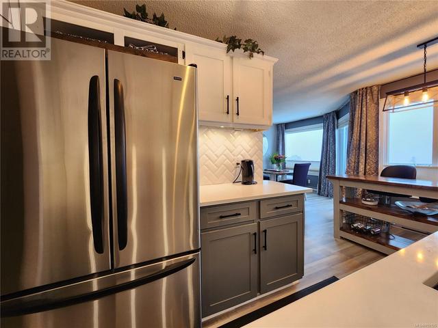 204b - 6231 Blueback Rd, Condo with 2 bedrooms, 1 bathrooms and 2 parking in Nanaimo BC | Image 8