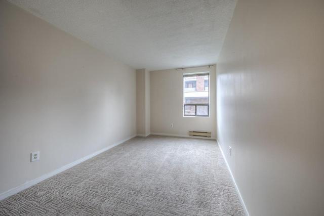 203 - 19 Dundonald St, Condo with 2 bedrooms, 2 bathrooms and 1 parking in Toronto ON | Image 11