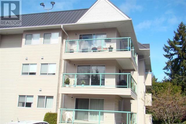301 - 6715 Dover Rd, Condo with 2 bedrooms, 2 bathrooms and 1 parking in Nanaimo BC | Image 2