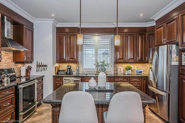 Chefs kitchen with high end cabinetry and upgraded stainless steel appliances | Image 48