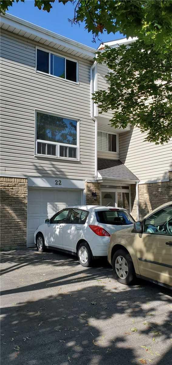 22 Celeste Dr, Townhouse with 3 bedrooms, 2 bathrooms and 2 parking in Toronto ON | Image 1