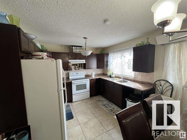 13411 61 St Nw, House detached with 4 bedrooms, 1 bathrooms and null parking in Edmonton AB | Image 2