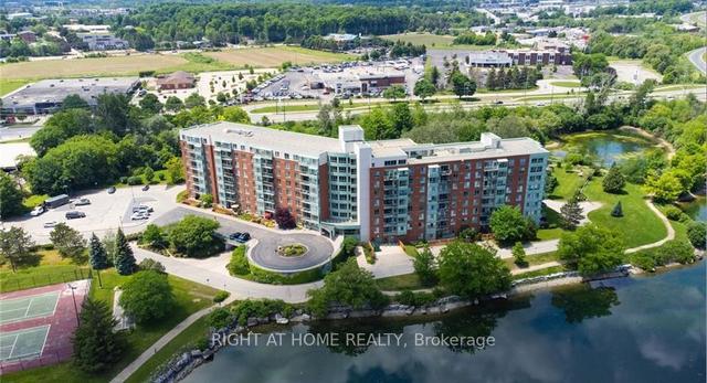 606 - 30 Blue Springs Dr, Condo with 2 bedrooms, 2 bathrooms and 1 parking in Waterloo ON | Image 1