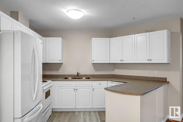 306 - 9930 100 Av, Condo with 2 bedrooms, 2 bathrooms and 1 parking in Fort Saskatchewan AB | Image 16