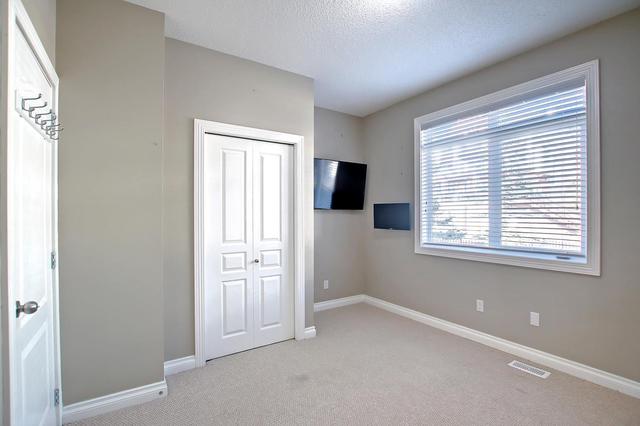 12 - 117 Rockyledge View Nw, Home with 2 bedrooms, 2 bathrooms and 2 parking in Calgary AB | Image 11