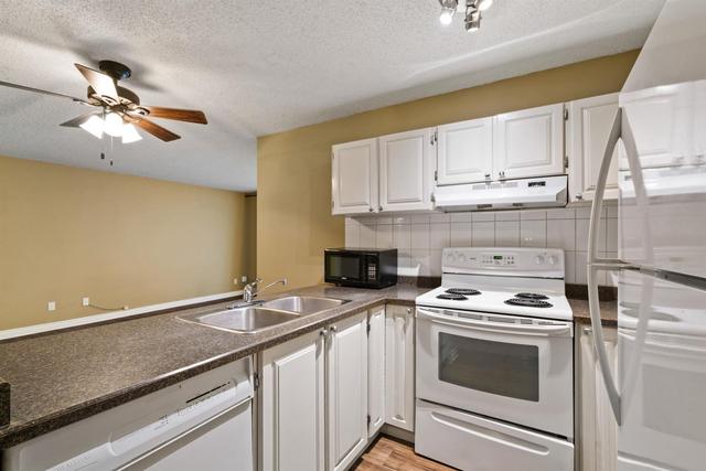 202 - 1915 26 Street Sw, Condo with 2 bedrooms, 1 bathrooms and 1 parking in Calgary AB | Image 2