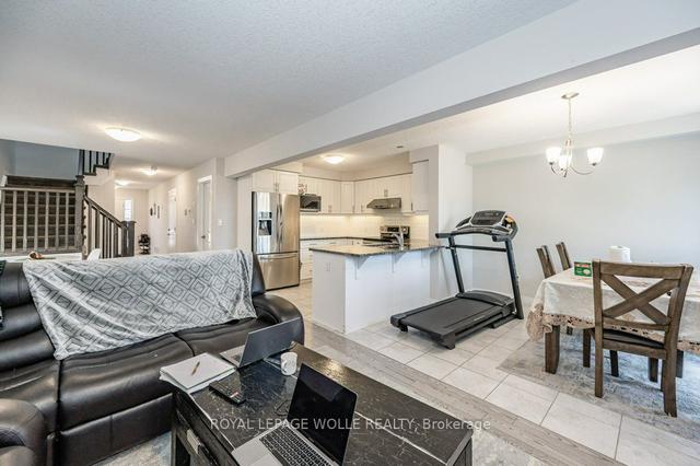 a - 606 Montpellier Dr, House semidetached with 4 bedrooms, 3 bathrooms and 2 parking in Waterloo ON | Image 4