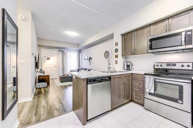 111 - 620 Sauve St, Condo with 2 bedrooms, 2 bathrooms and 1 parking in Milton ON | Image 2