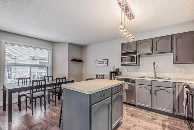214 Mt Douglas Manor Se, Home with 3 bedrooms, 1 bathrooms and 2 parking in Calgary AB | Image 8