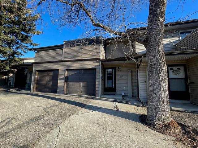 22 - 4025 Glacier Avenue S, Home with 3 bedrooms, 2 bathrooms and 2 parking in Lethbridge AB | Image 1