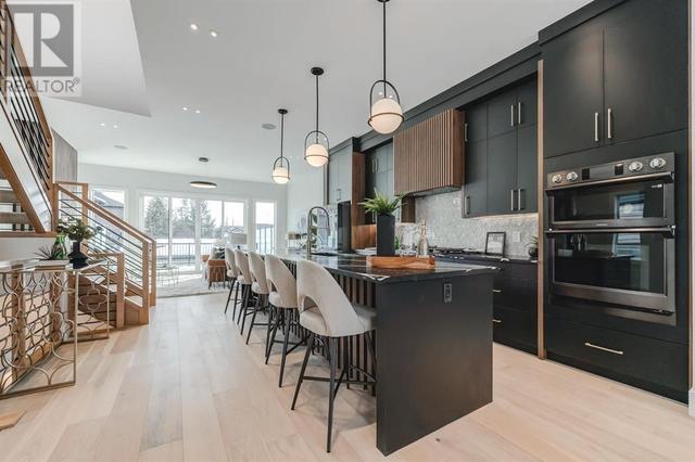928 33a Street Nw, House semidetached with 4 bedrooms, 3 bathrooms and 2 parking in Calgary AB | Image 5