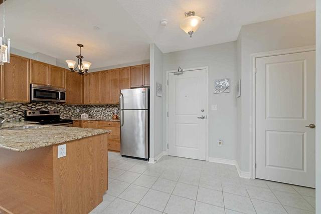 218 - 33 Whitmer St, Condo with 2 bedrooms, 2 bathrooms and 1 parking in Milton ON | Image 31