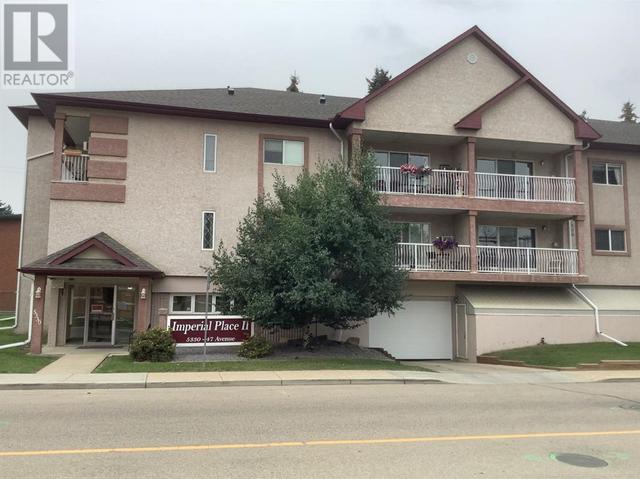 303, - 5330 47 Avenue, Condo with 2 bedrooms, 2 bathrooms and 2 parking in Red Deer AB | Image 1