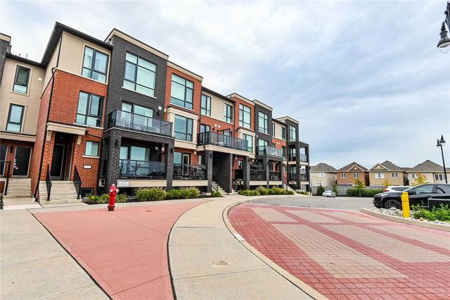 110 - 100 Dufay Rd, Townhouse with 2 bedrooms, 2 bathrooms and 1 parking in Brampton ON | Image 1