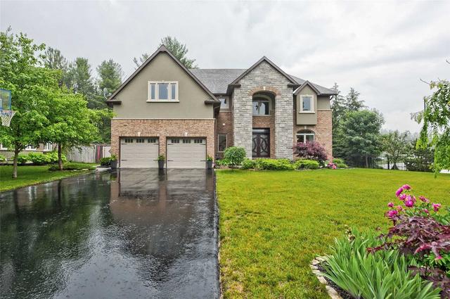 49 Heatherwood Dr, House detached with 4 bedrooms, 4 bathrooms and 11 parking in Springwater ON | Image 1