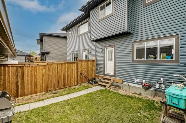 11 Belgian Lane, House attached with 3 bedrooms, 2 bathrooms and 4 parking in Cochrane AB | Image 31