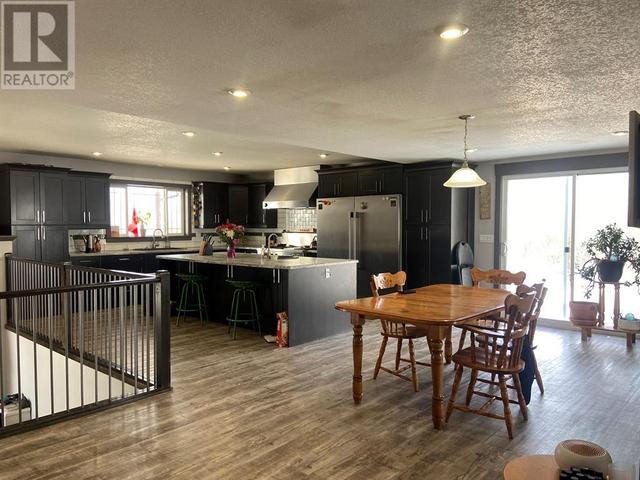 225041 690, House detached with 5 bedrooms, 3 bathrooms and 15 parking in Northern Lights County AB | Image 15