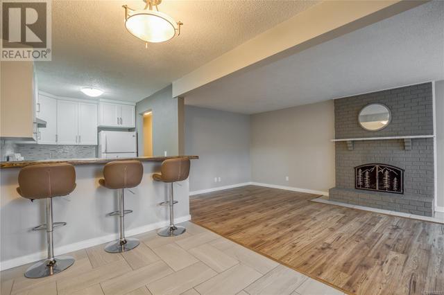 24 - 211 Buttertubs Dr, House attached with 2 bedrooms, 1 bathrooms and 1 parking in Nanaimo BC | Card Image
