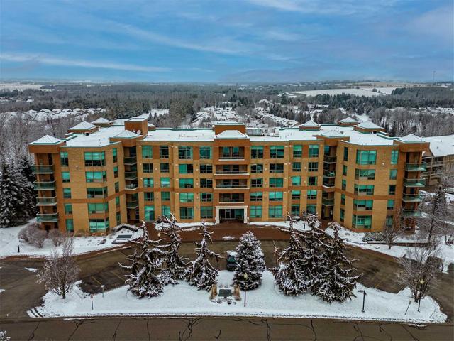 107 - 4 Briar Hill Hts, Condo with 2 bedrooms, 2 bathrooms and 2 parking in New Tecumseth ON | Image 1