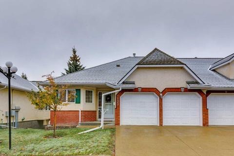 133 Sienna Park Green Sw, Home with 3 bedrooms, 2 bathrooms and 4 parking in Calgary AB | Card Image