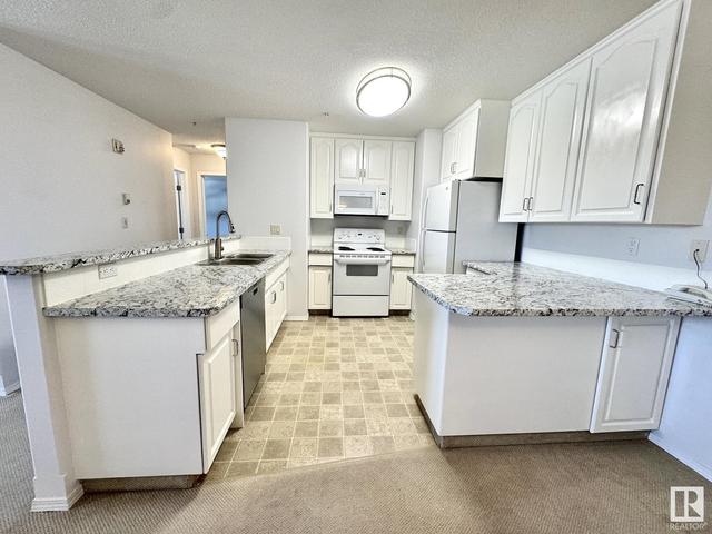 206 - 4604 48a St, Condo with 2 bedrooms, 1 bathrooms and null parking in Leduc AB | Image 18