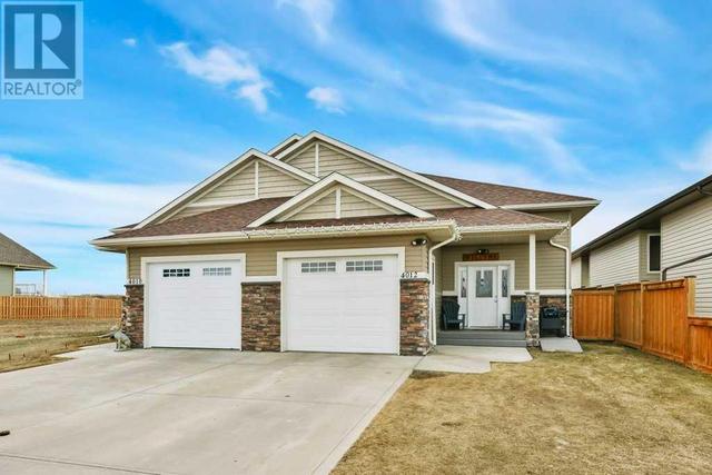 4012 68 Street, House semidetached with 4 bedrooms, 3 bathrooms and 2 parking in Stettler AB | Image 2