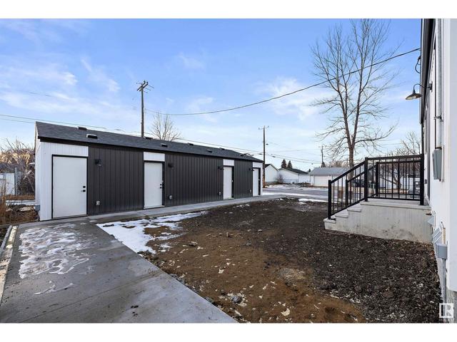 15105 108 Av Nw, House attached with 3 bedrooms, 3 bathrooms and null parking in Edmonton AB | Image 9