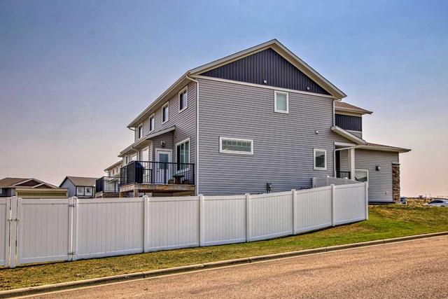 64 Cameron Close, Home with 4 bedrooms, 3 bathrooms and 2 parking in Sylvan Lake AB | Image 39
