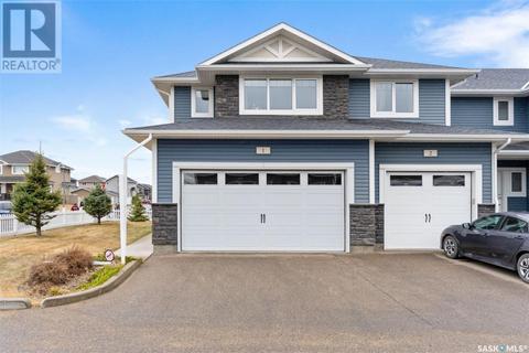 1 - 115 Veltkamp Crescent, House attached with 3 bedrooms, 3 bathrooms and null parking in Saskatoon SK | Card Image