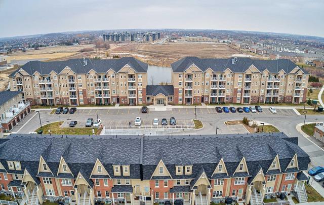 106 - 1370 Costigan Rd, Condo with 2 bedrooms, 2 bathrooms and 1 parking in Milton ON | Image 2