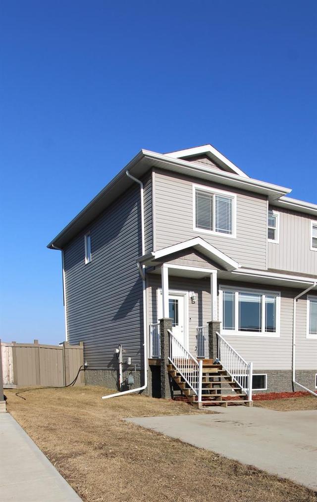 12650 103b Street, Home with 3 bedrooms, 2 bathrooms and 2 parking in Grande Prairie AB | Image 1