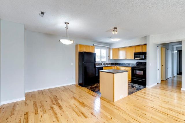 112 - 1540 29 Street Nw, Condo with 2 bedrooms, 1 bathrooms and 1 parking in Calgary AB | Image 4