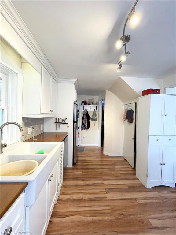 kitchen with doorway to basement | Image 3