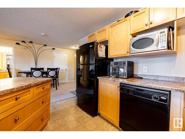 104 - 111 Edwards Dr Sw, Condo with 2 bedrooms, 2 bathrooms and null parking in Edmonton AB | Card Image
