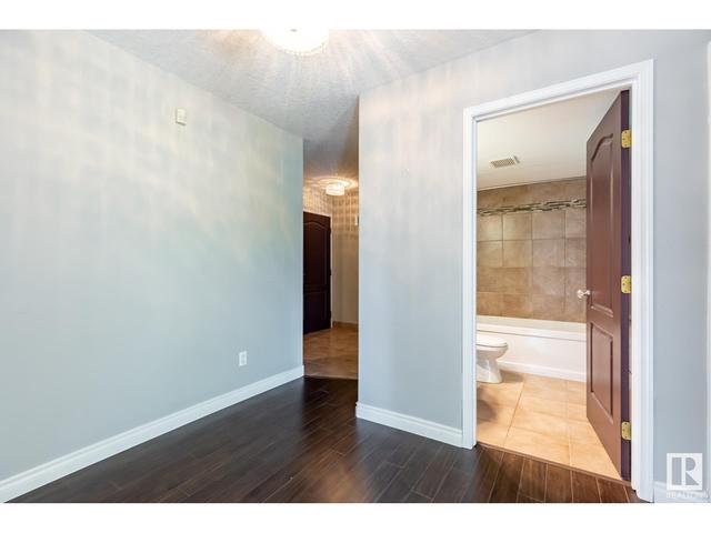 202 - 12205 111 Av Nw, Condo with 2 bedrooms, 2 bathrooms and 1 parking in Edmonton AB | Image 31