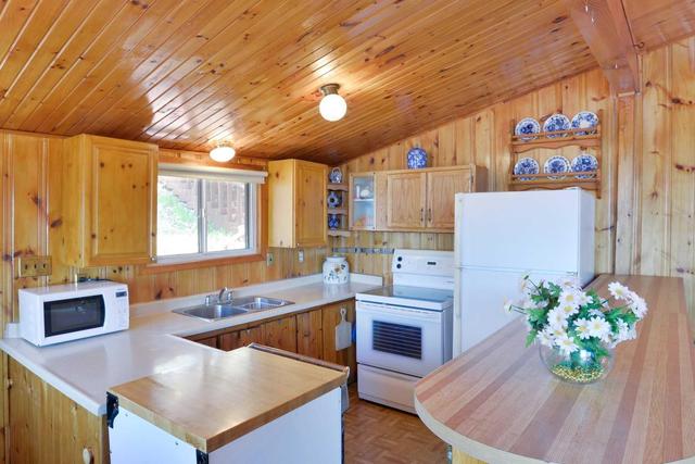11 - 1054 Deewood Dr, House detached with 4 bedrooms, 2 bathrooms and 6 parking in Muskoka Lakes ON | Image 9