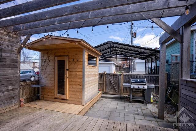 Sauna was installed in 2022 by Chinook and an EV car charger was added for the carport. Carport can fit 2 cars. | Image 29