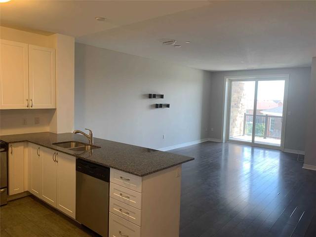310 - 33 Whitmer St, Condo with 2 bedrooms, 3 bathrooms and 1 parking in Milton ON | Image 11