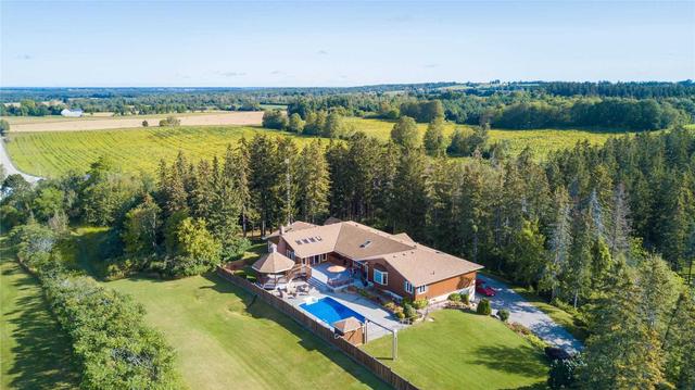 10420 Russell Rd, House detached with 4 bedrooms, 5 bathrooms and 26 parking in Scugog ON | Image 1