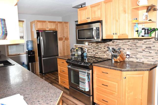 310 3 Avenue N, House detached with 4 bedrooms, 2 bathrooms and 4 parking in Vauxhall AB | Image 13