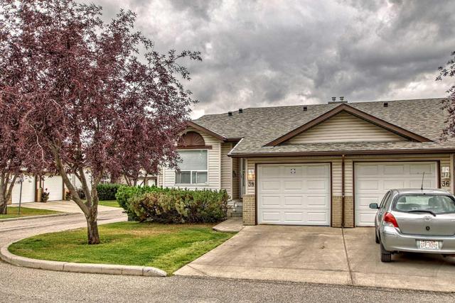 38 Tararidge Circle Ne, Home with 2 bedrooms, 2 bathrooms and 2 parking in Calgary AB | Image 3