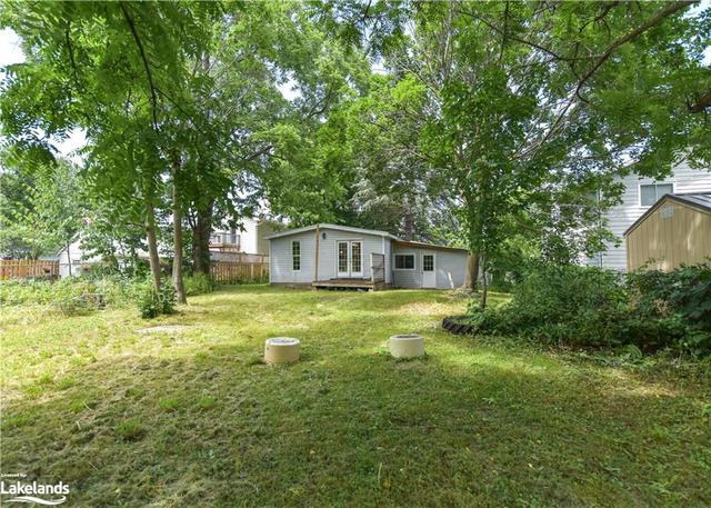 Partially fenced and well treed lot | Image 17