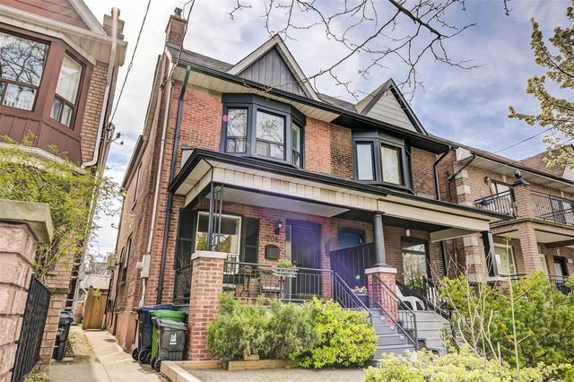 206 Emerson Ave, House semidetached with 3 bedrooms, 2 bathrooms and 2 parking in Toronto ON | Image 1